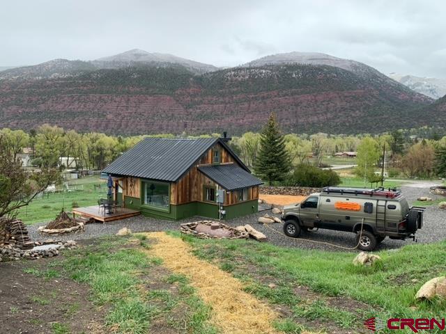 a house view with a garden space