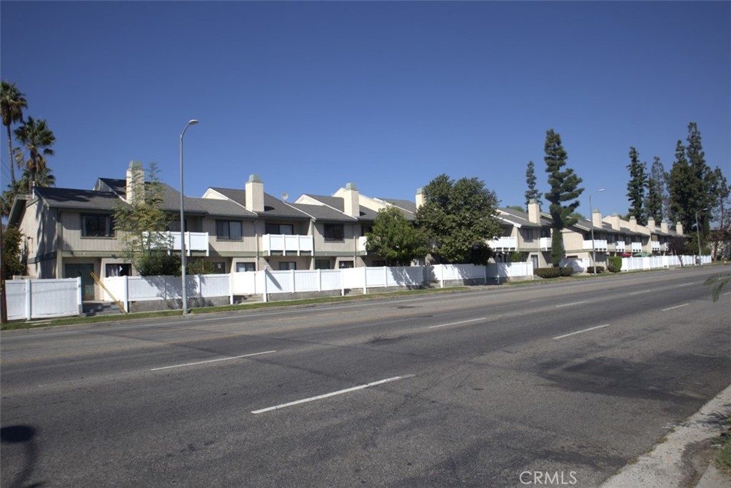 a view of street with houses