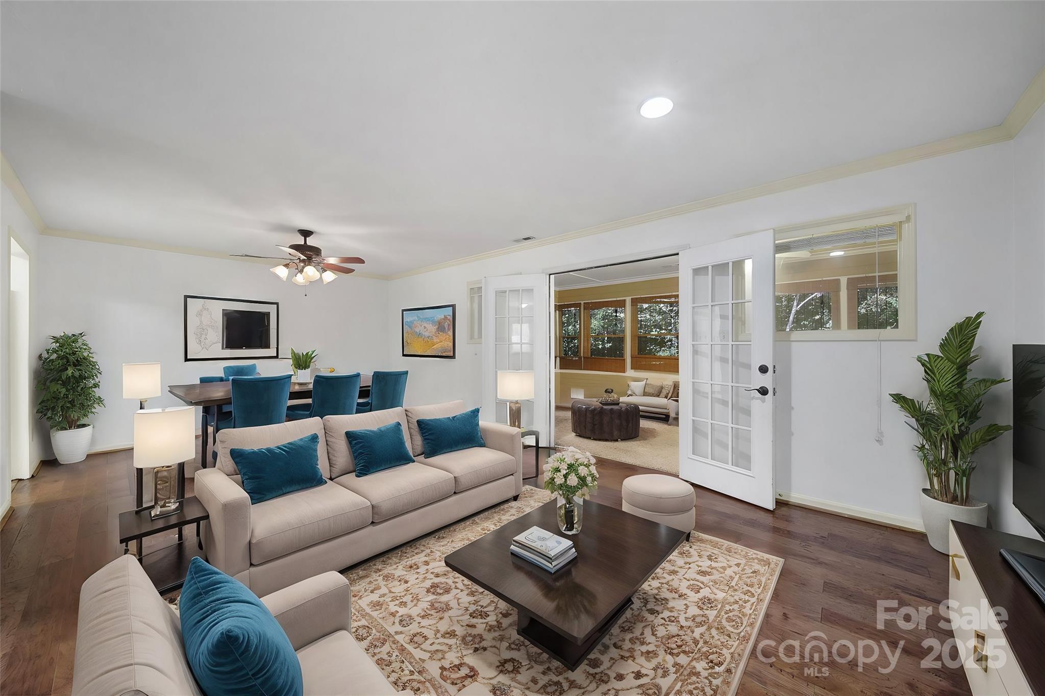 a living room with furniture and a rug