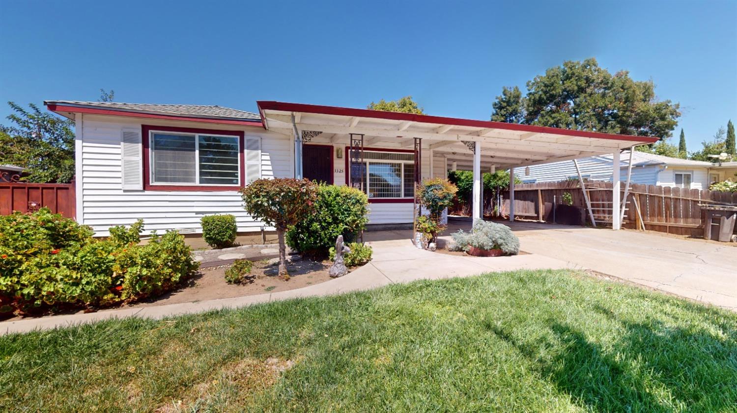 front view of a house with a patio