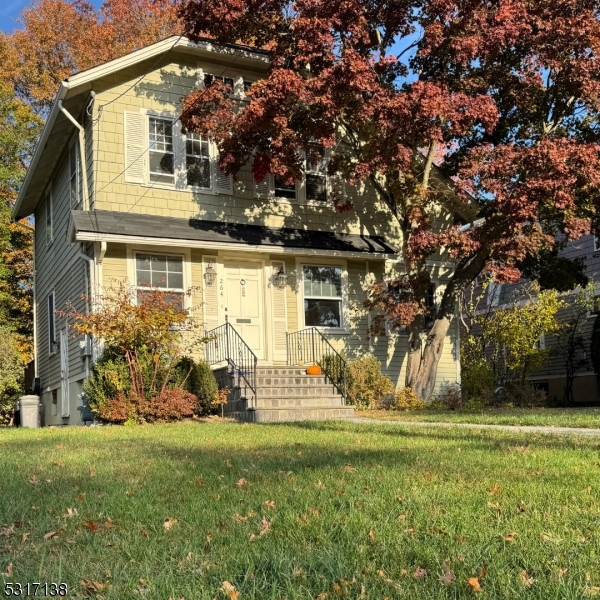 a front view of house with yard