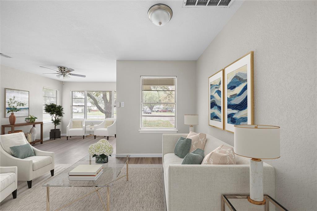 a living room with furniture and a window