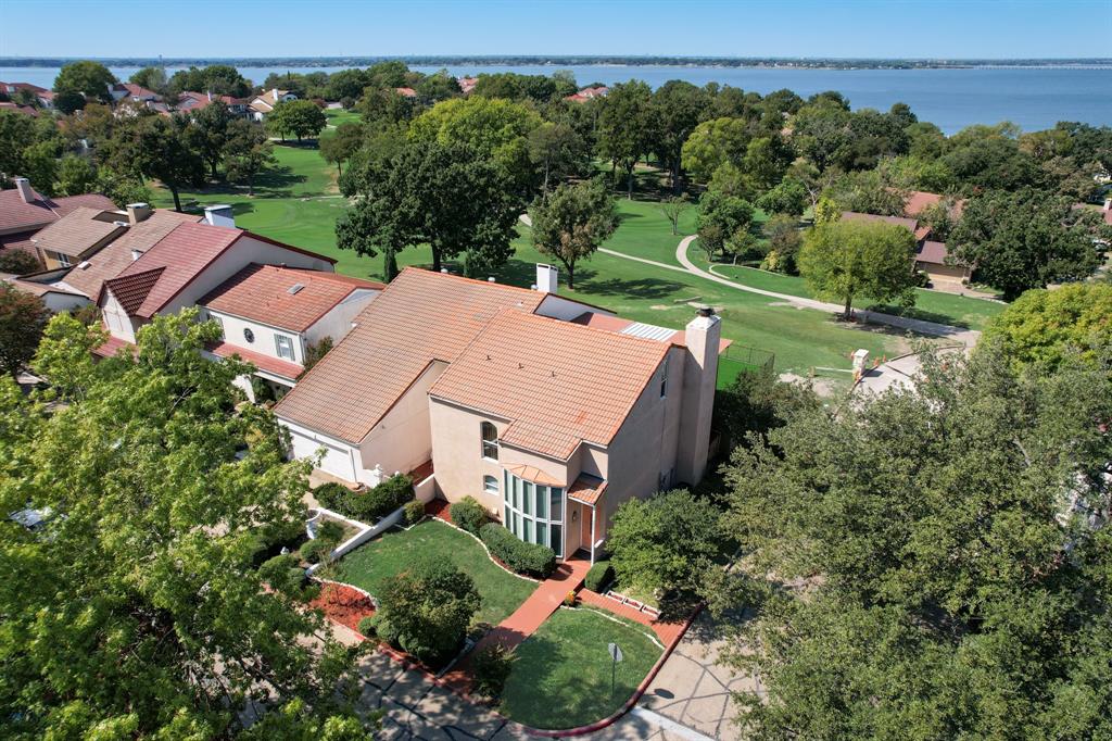 an aerial view of a house with a garden