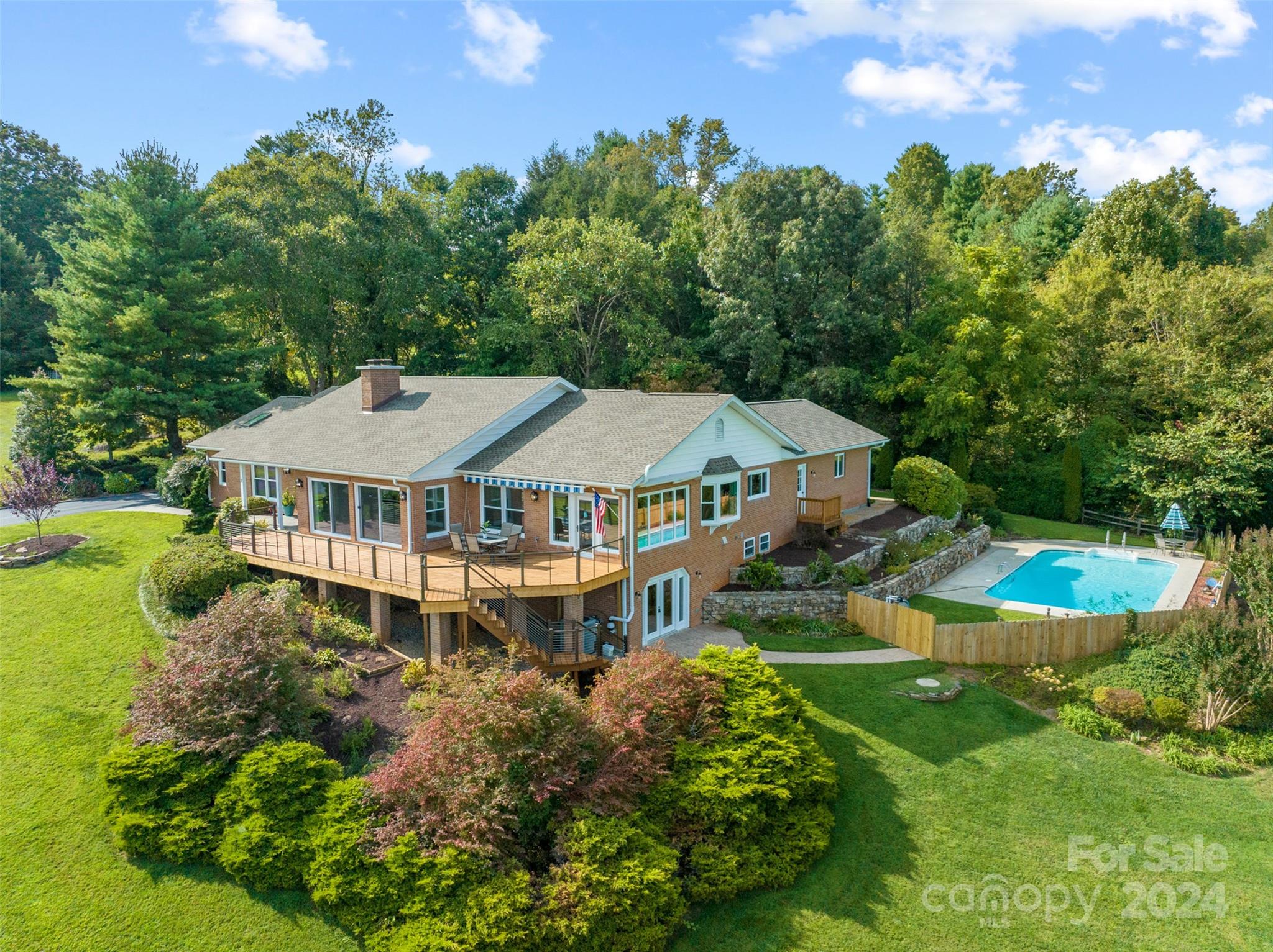 a aerial view of a house with garden