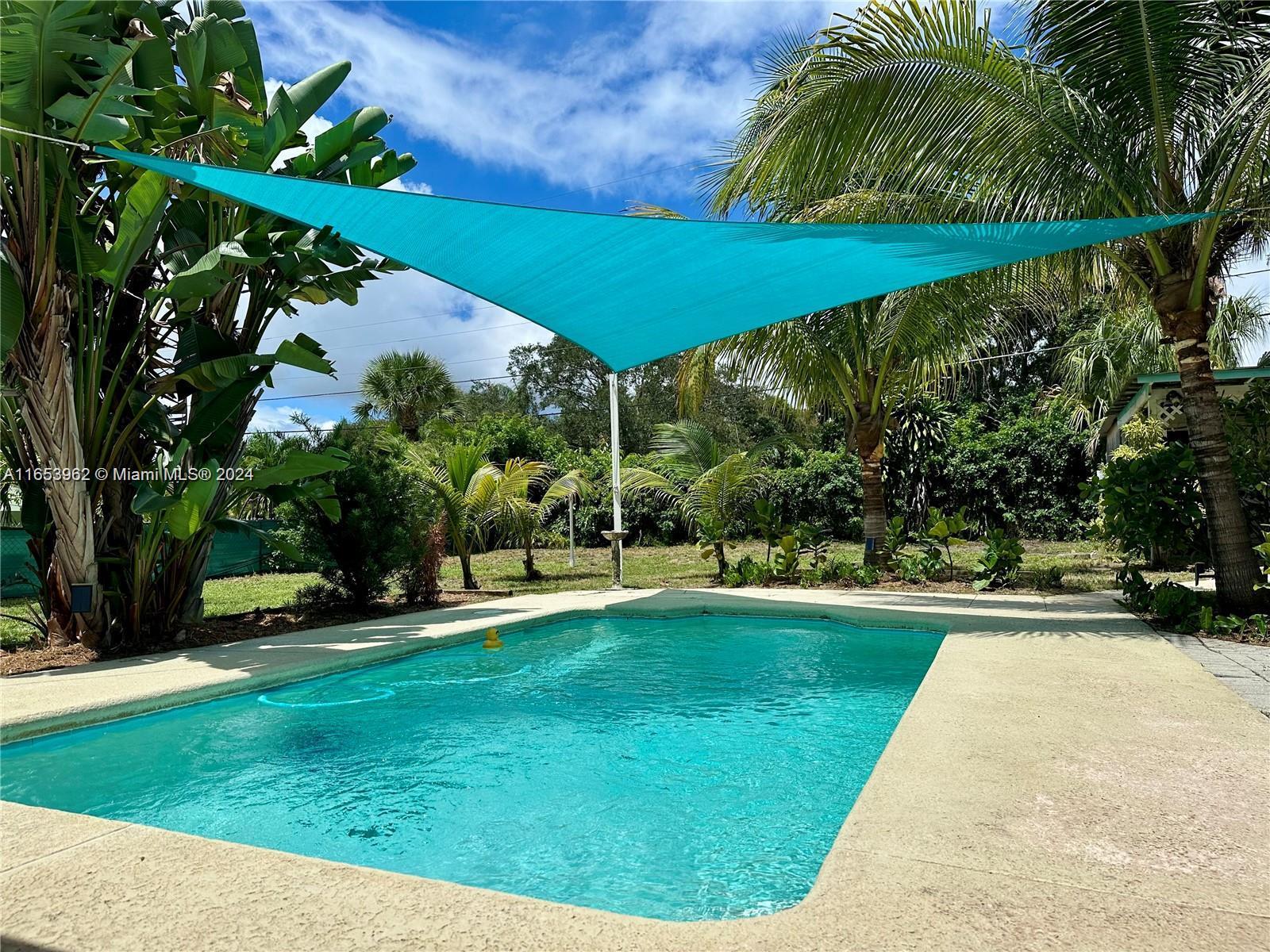 a view of a backyard with a garden