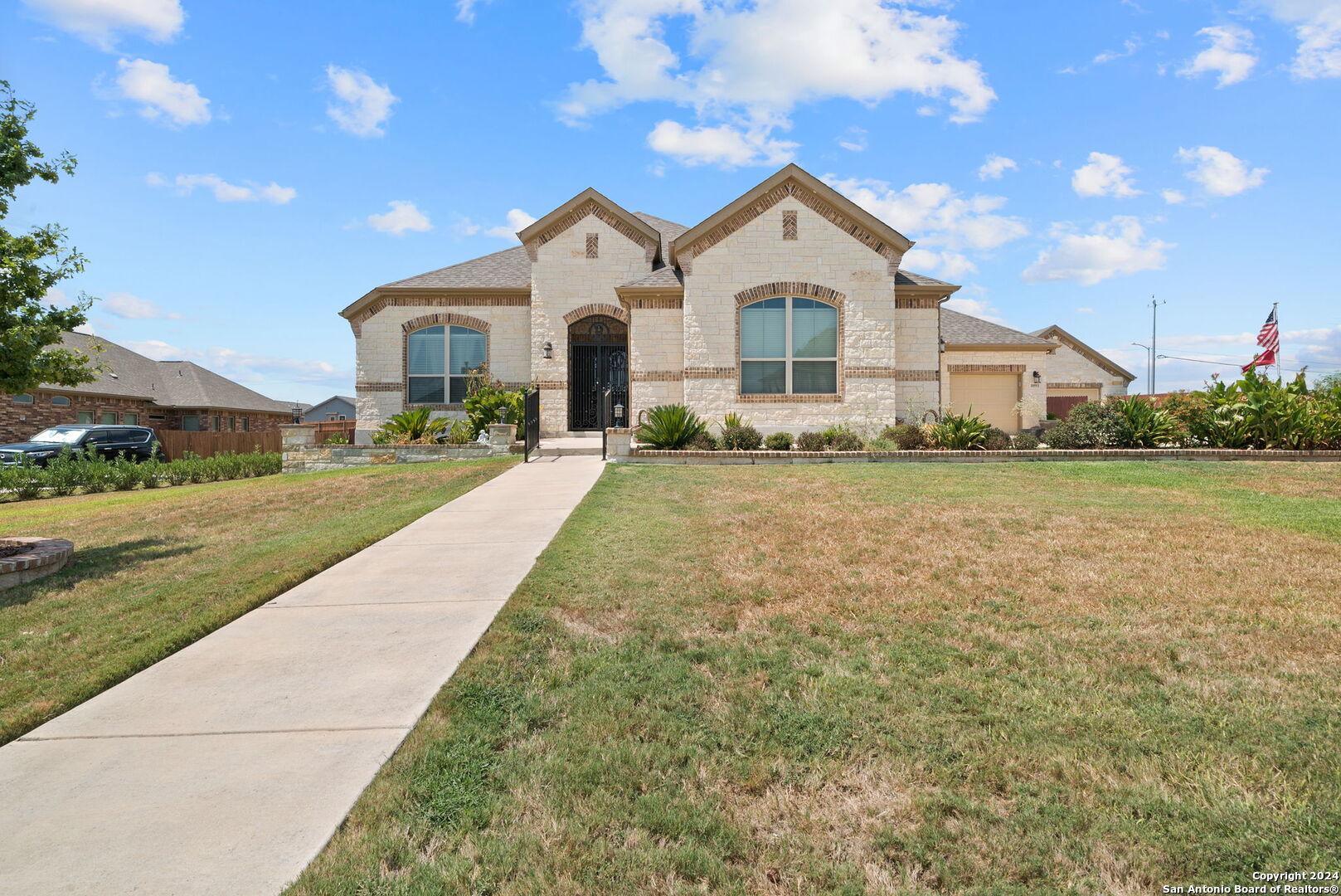 a front view of a house with a yard