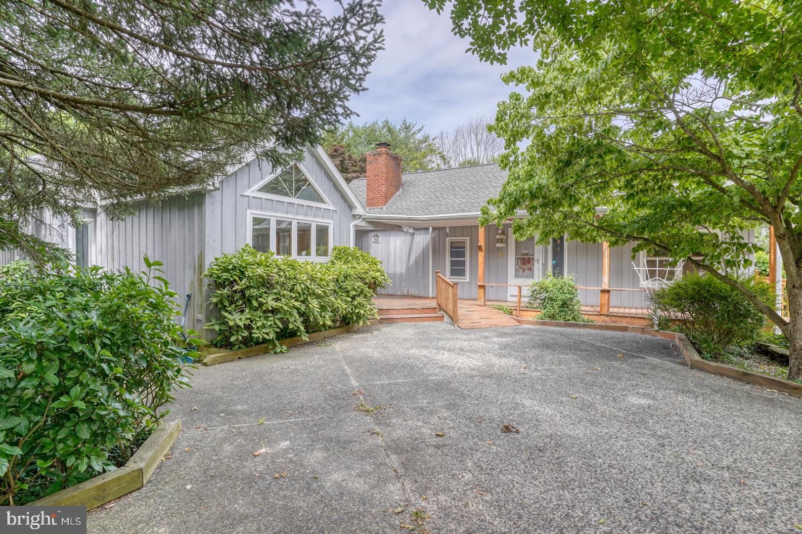 front view of a house with a small yard