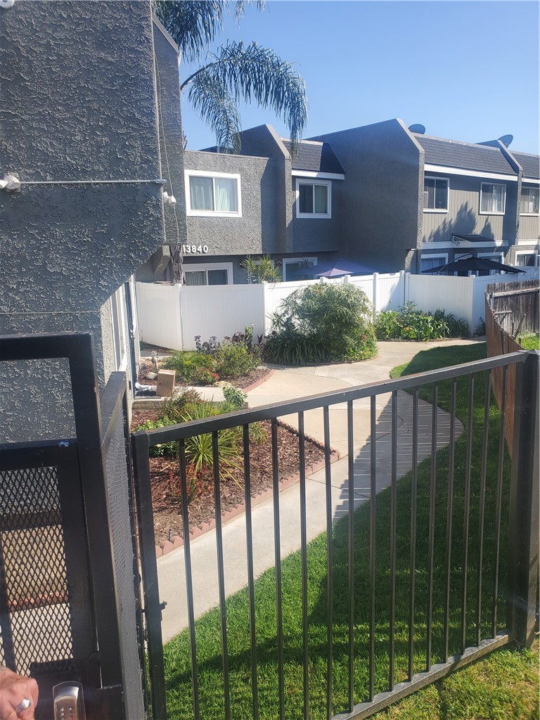 a view of balcony with furniture