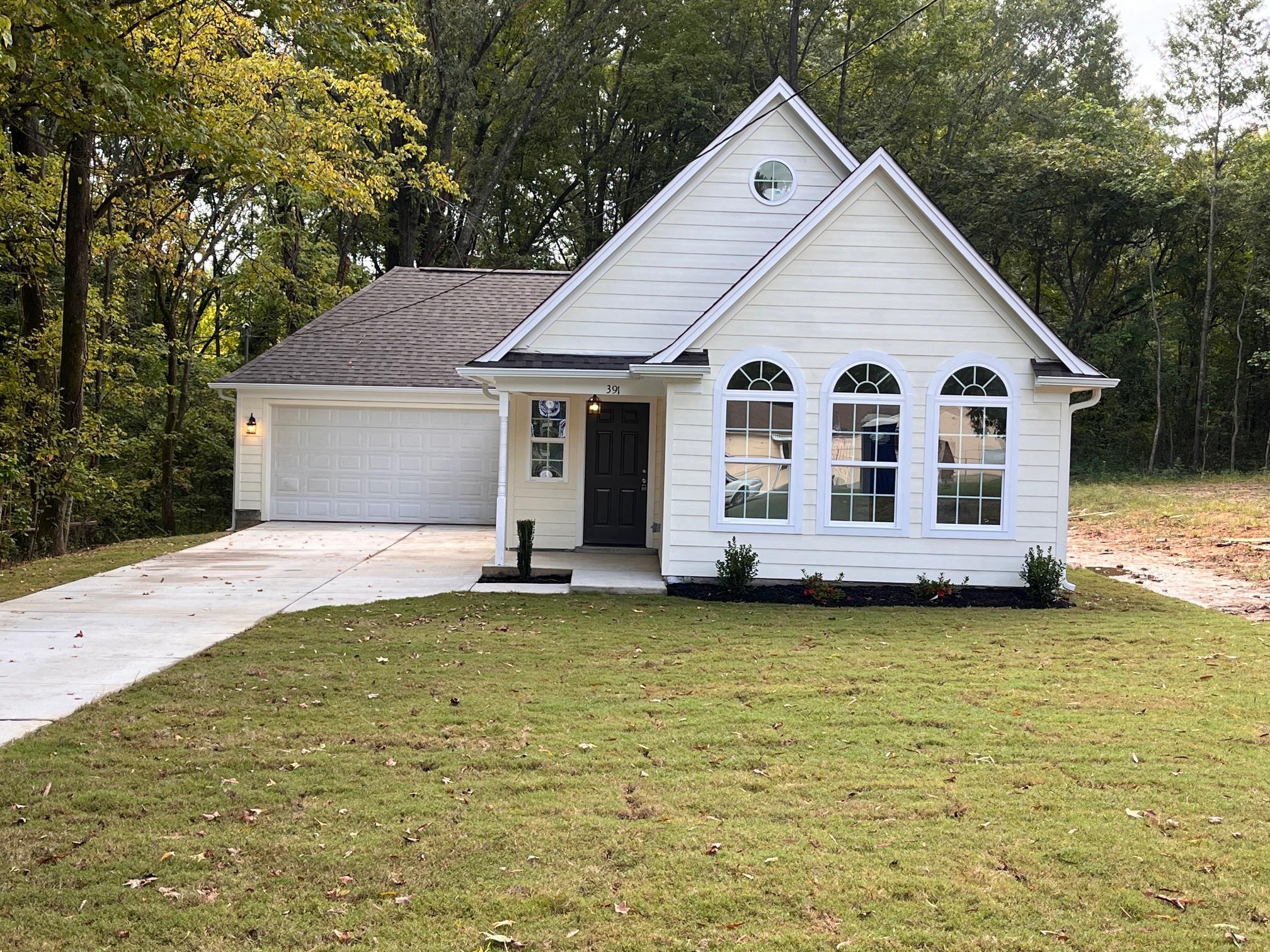 a view of a house with garden