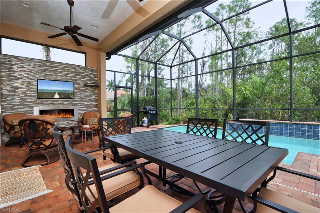 a view of a patio with a table chairs and a patio