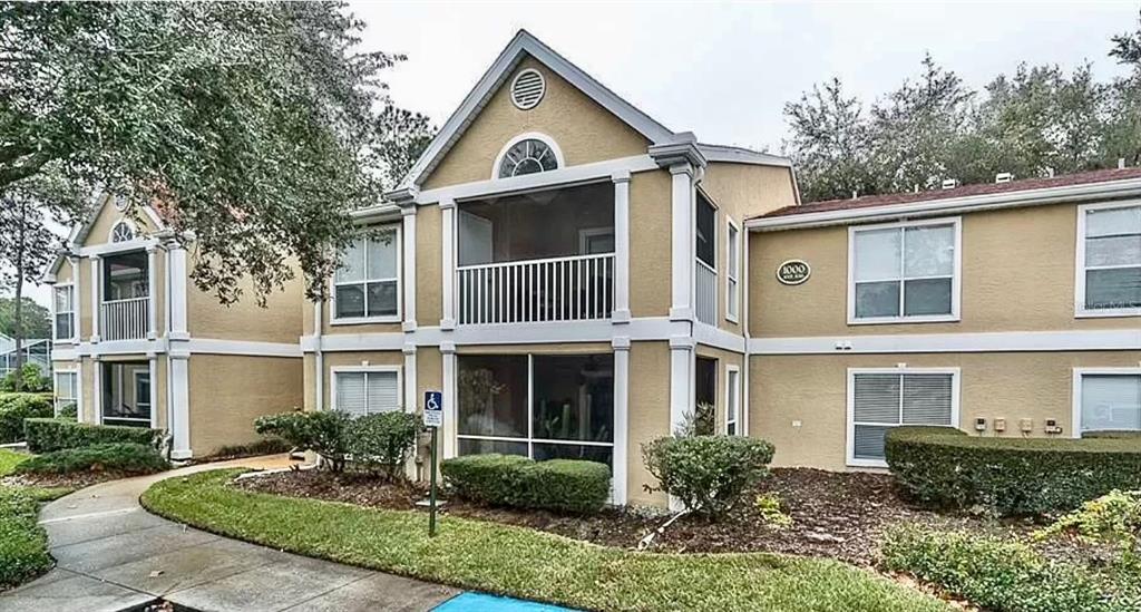 a view of a front of house with a yard