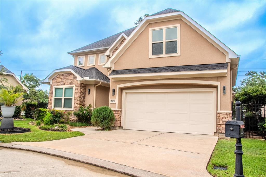 Welcome to 25718 N Muirfield Bend Court, Spring, TX 77389. Nestled within a gated community.