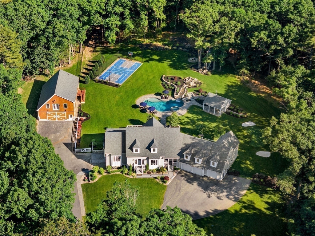 a view of swimming pool with a yard