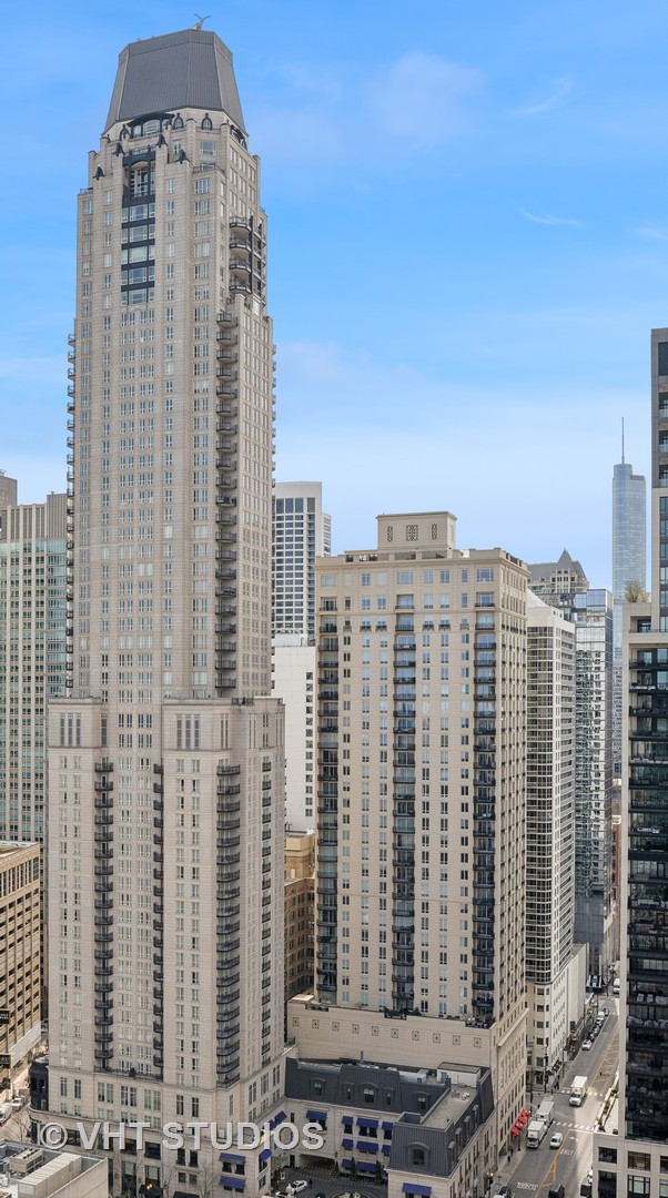 a view of a city with tall buildings