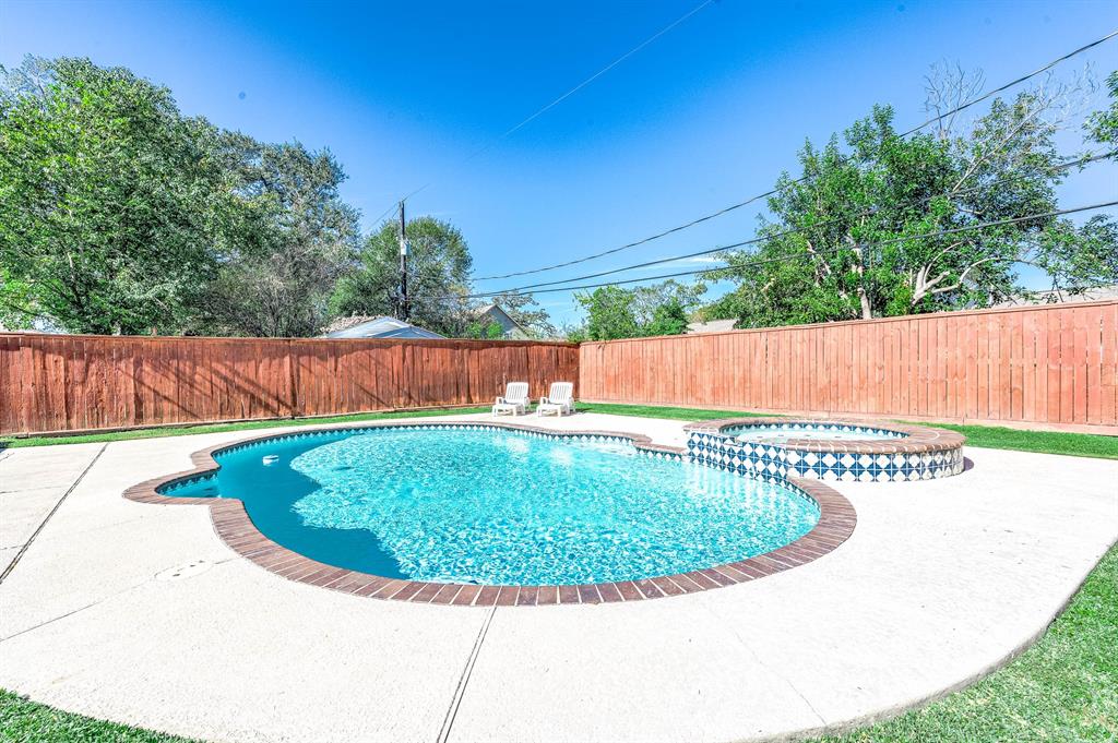 Welcome To Your Backyard Oasis With A Heated Pool & Spa.