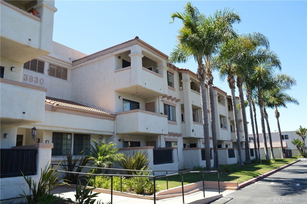 a front view of a building with garden