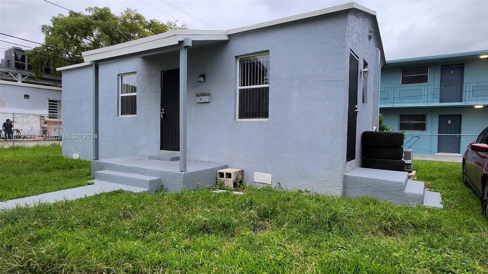 a front view of house with yard