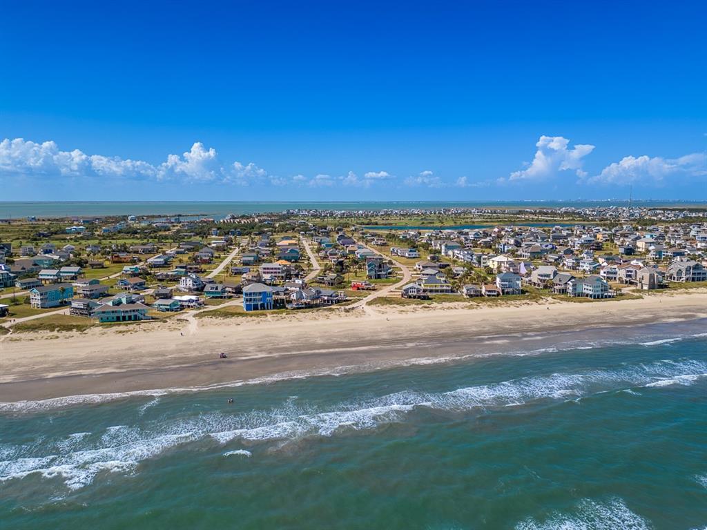 a view of an ocean and city