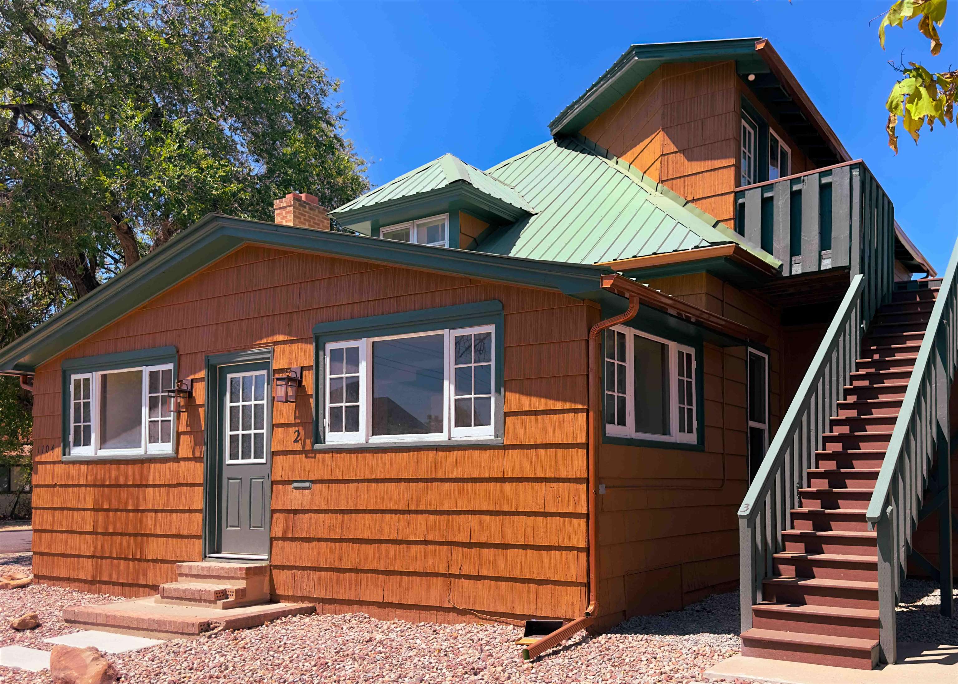 a front view of a house with garage