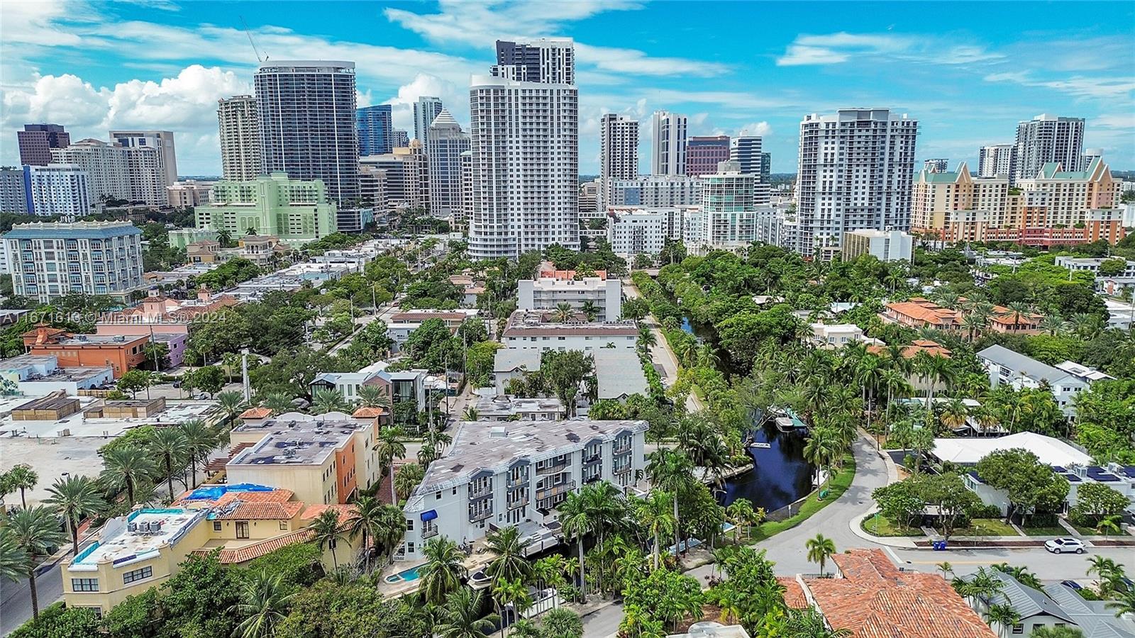 a view of a city with tall buildings