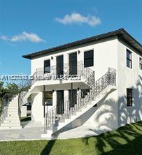 a front view of house with yard