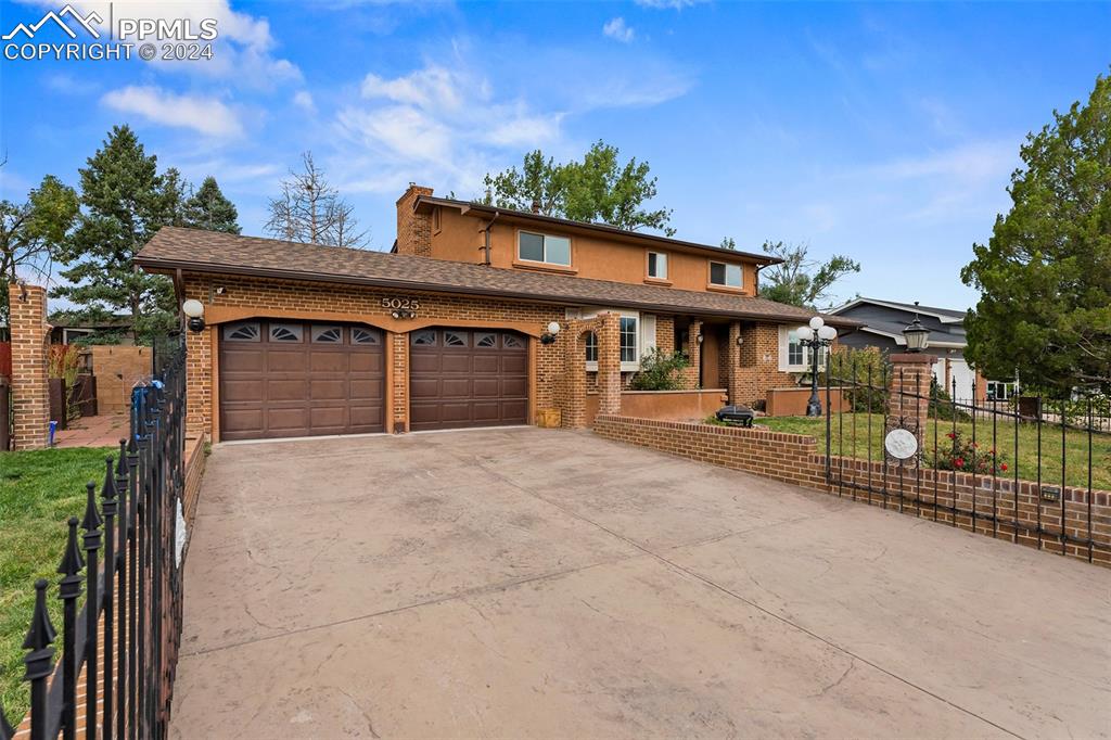 View of front of home with a garage