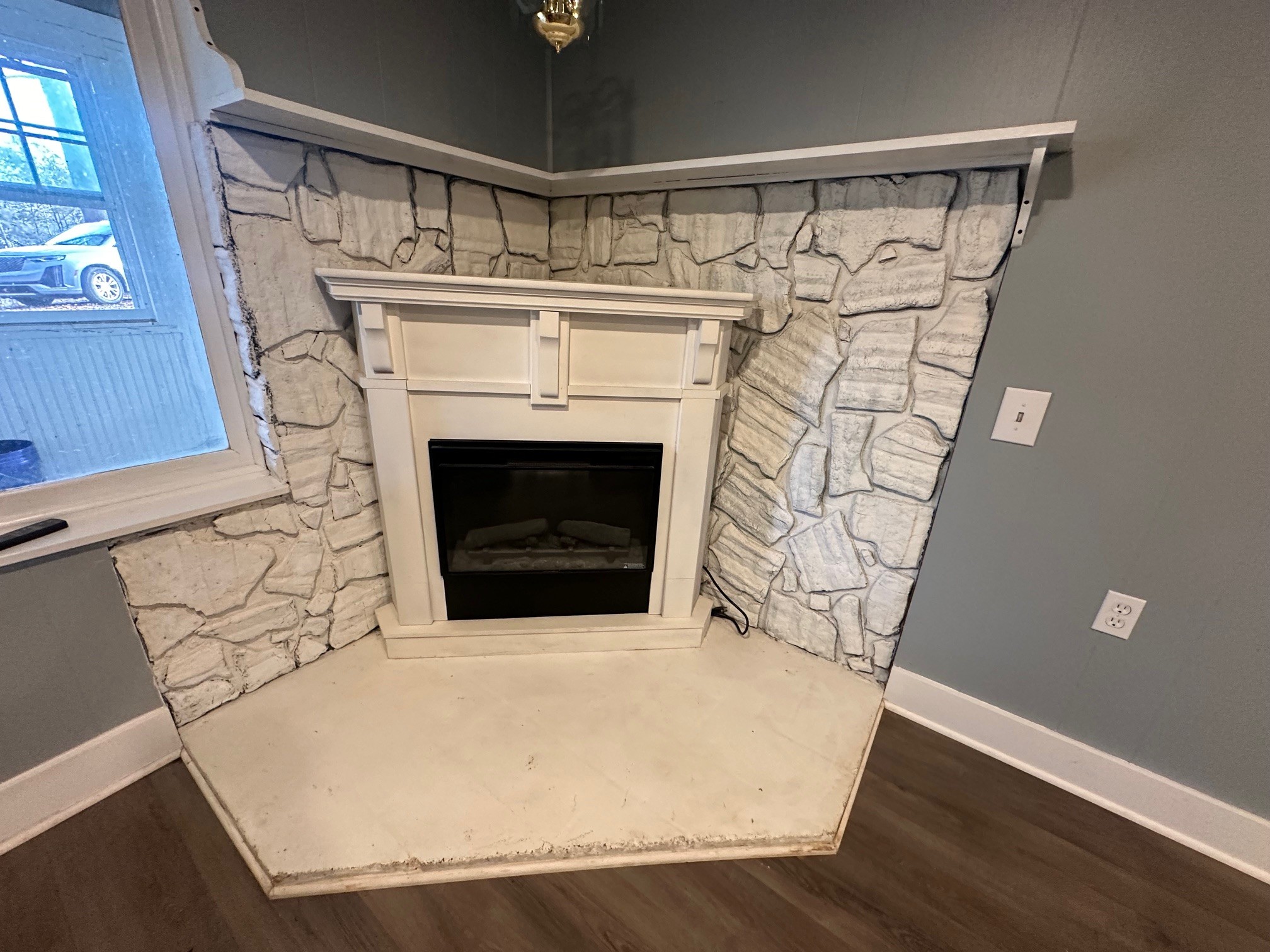 a living room with a fireplace