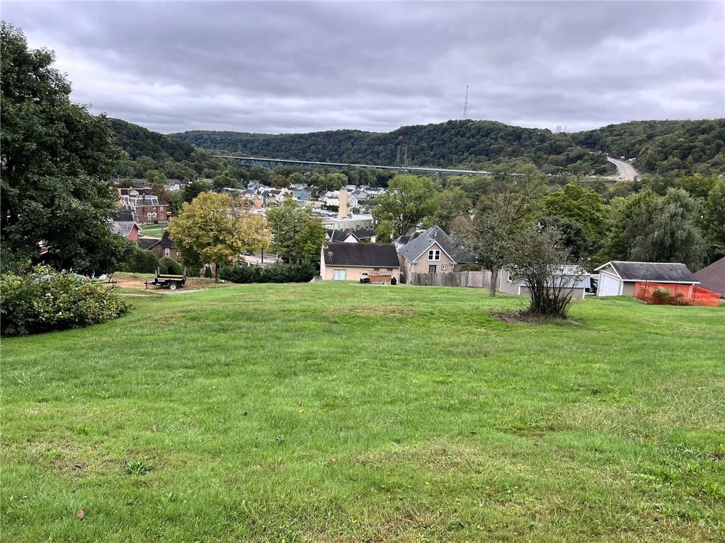 a view of a garden with houses