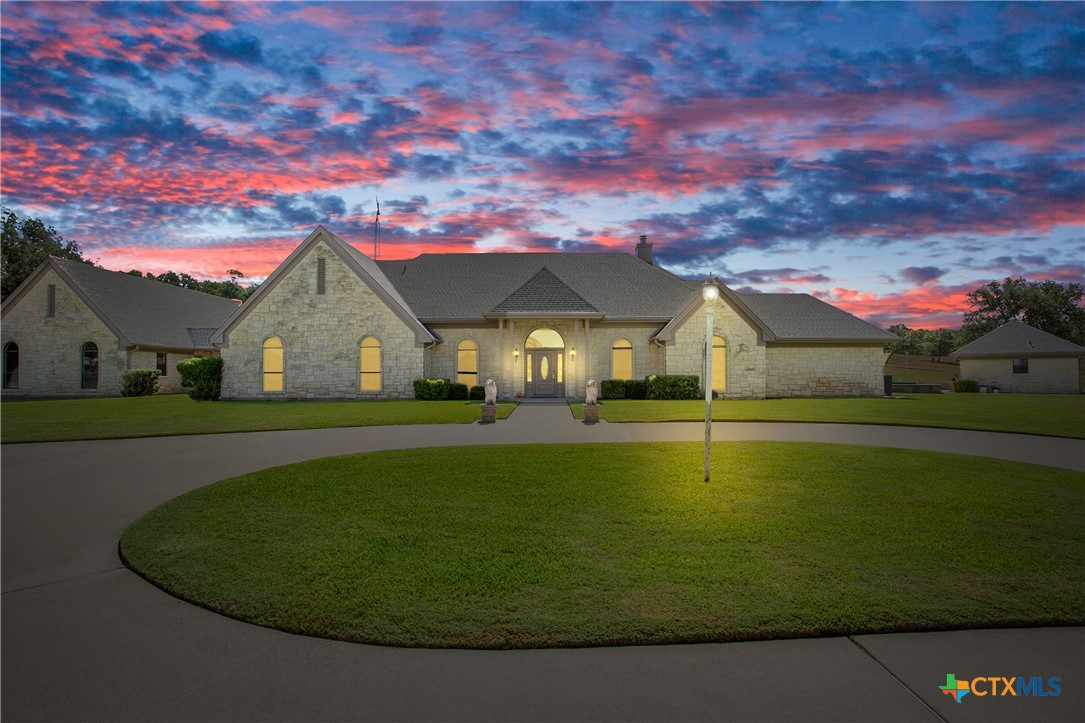 a front view of a house with swimming pool