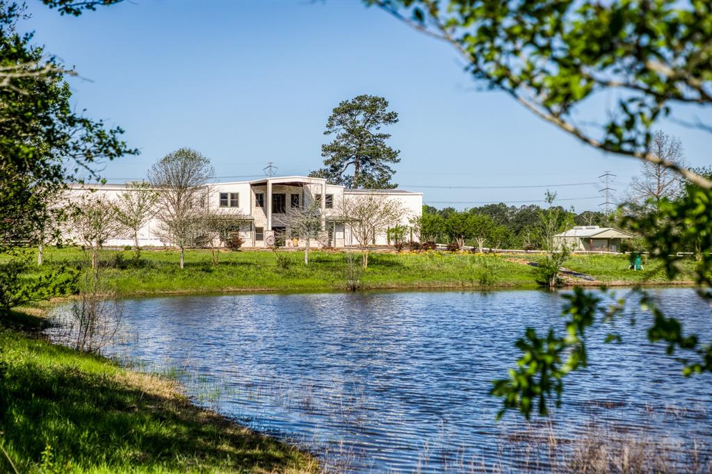 a view of a lake with a yard