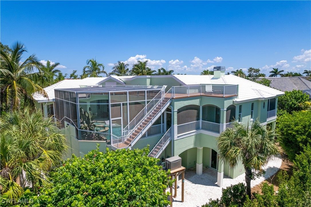 an aerial view of a house with a garden