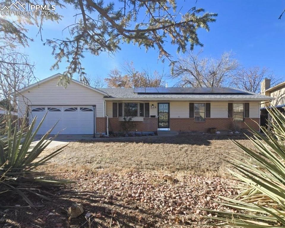 a house with trees in the background