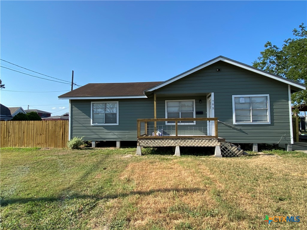 a front view of house with yard