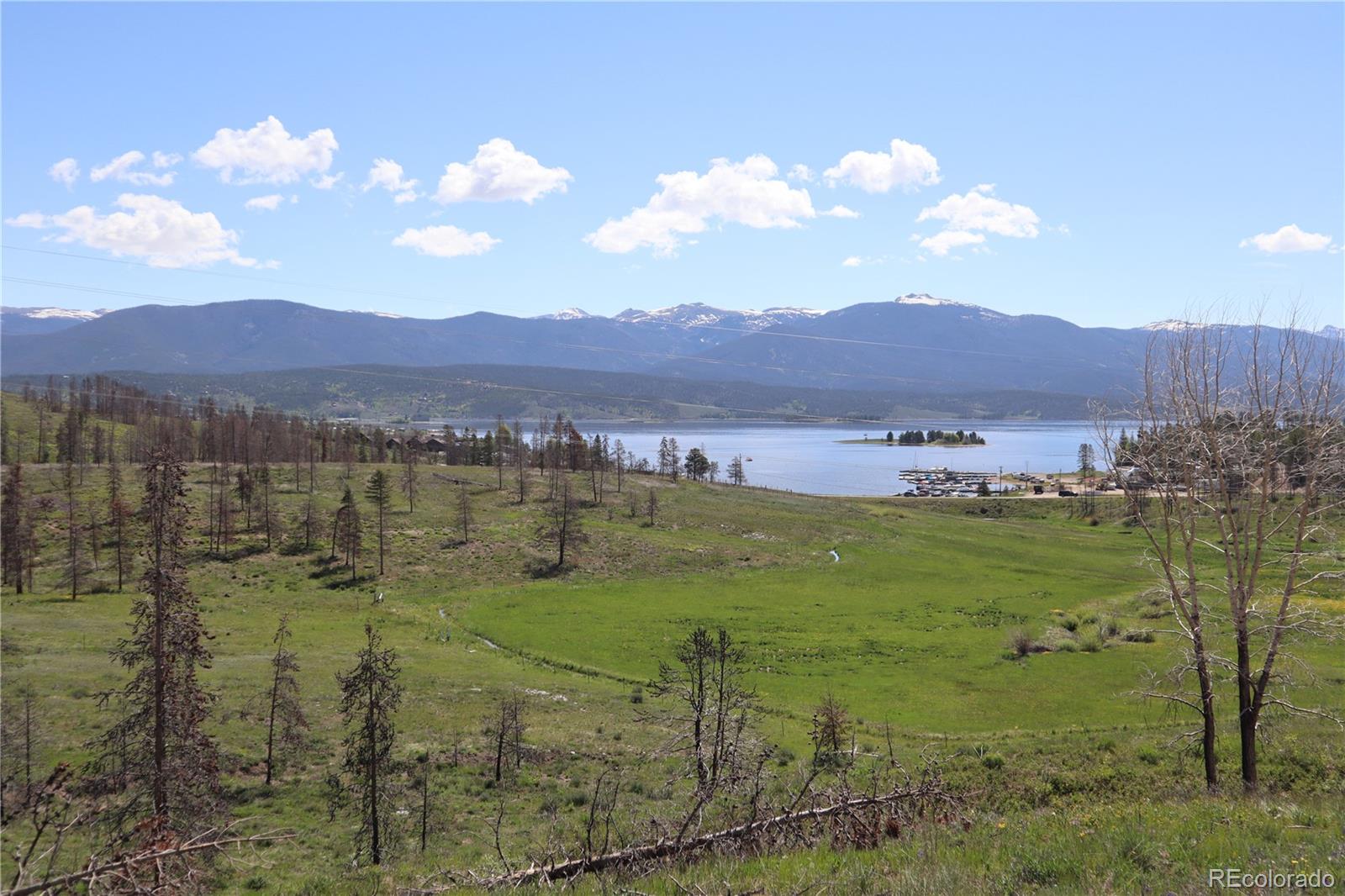 a view of lake and mountain