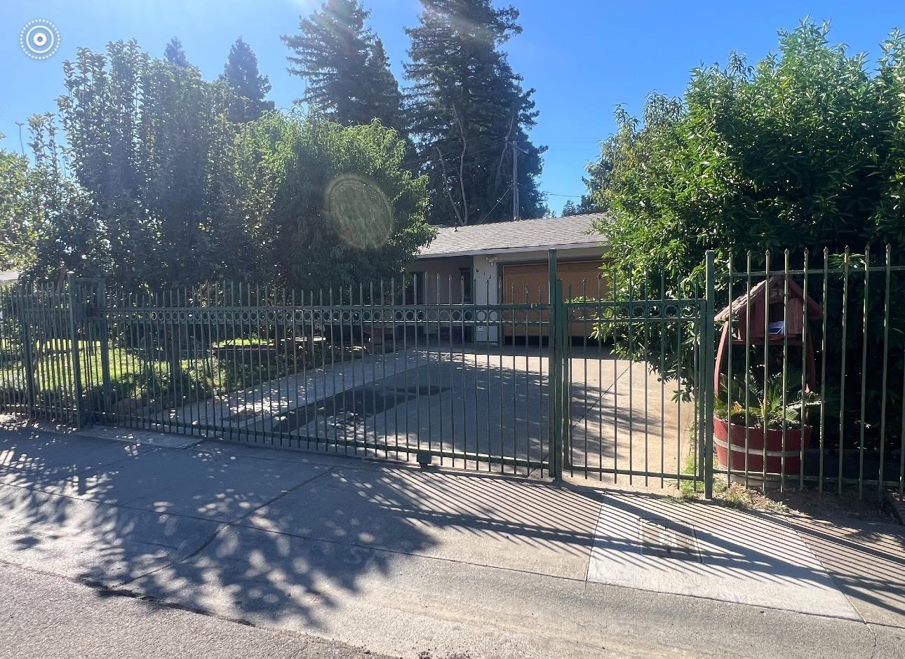 a view of a house with a street