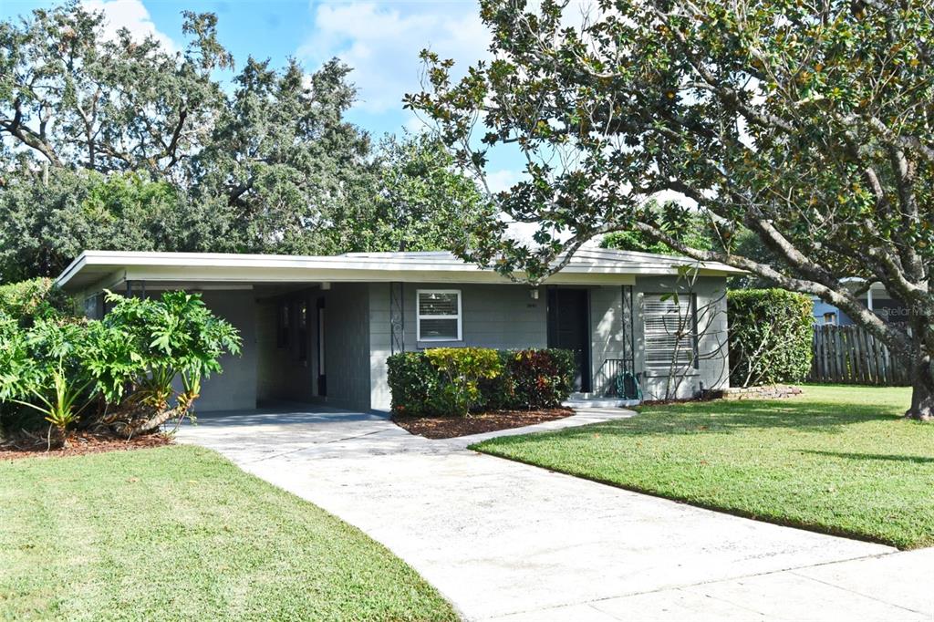 front view of a house with a yard