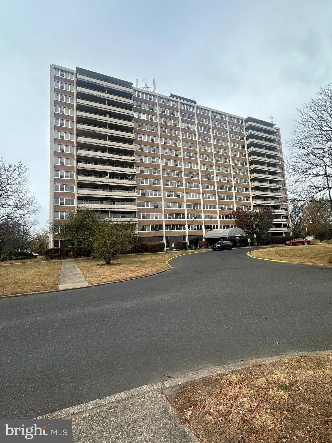 a view of a building with a road