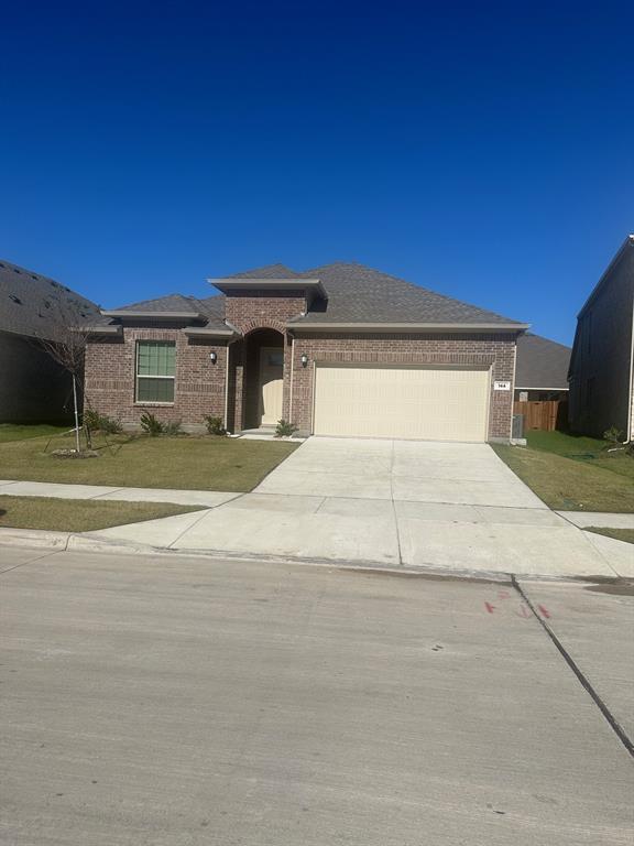 a view of a house with a garage