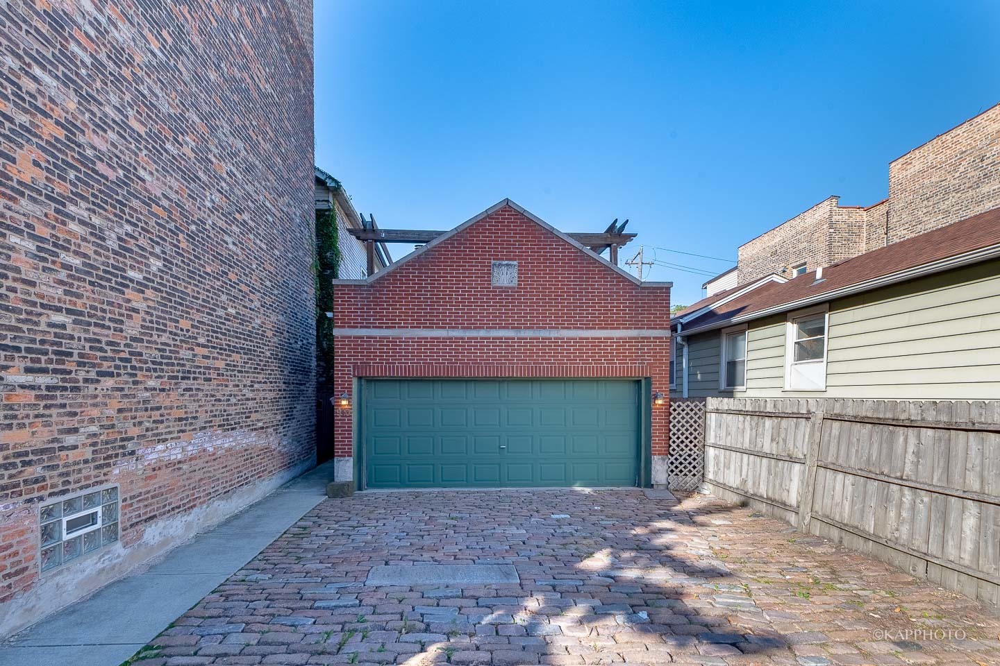 a front view of a house with a garage