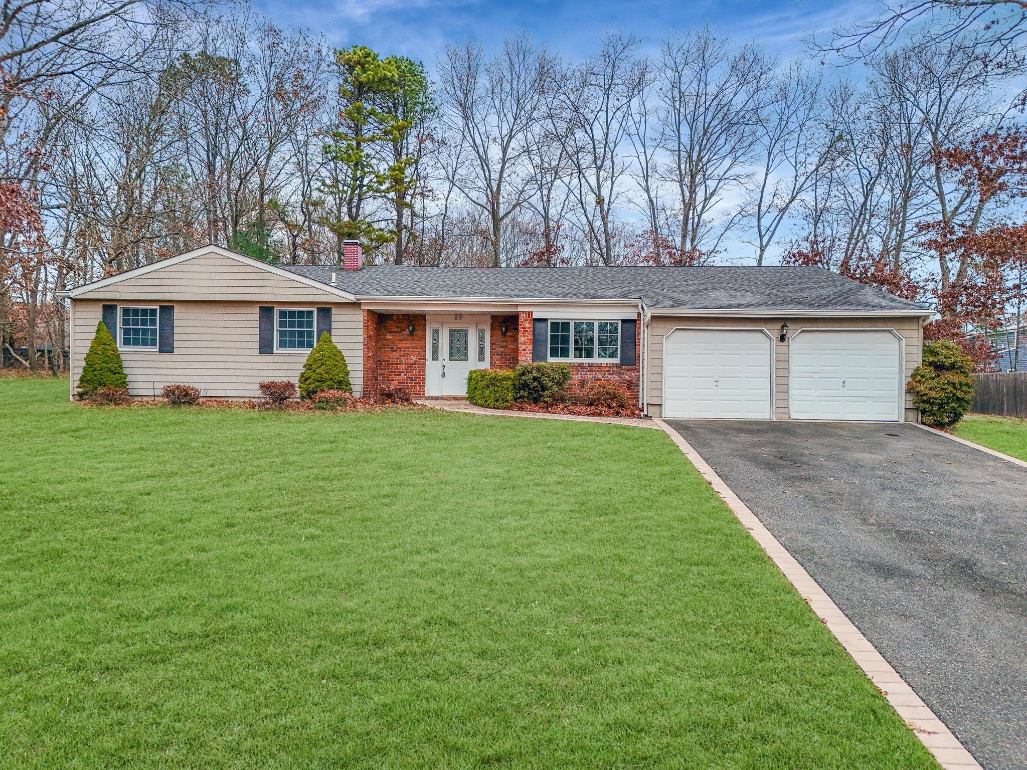 front view of a house and a yard