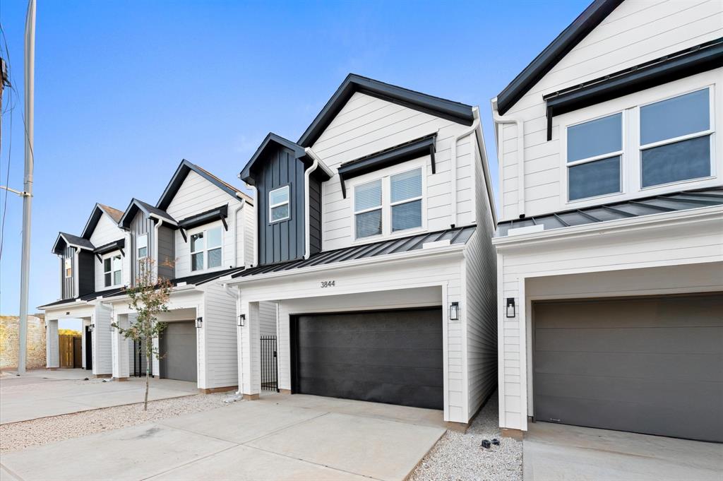 a front view of a house with a garage