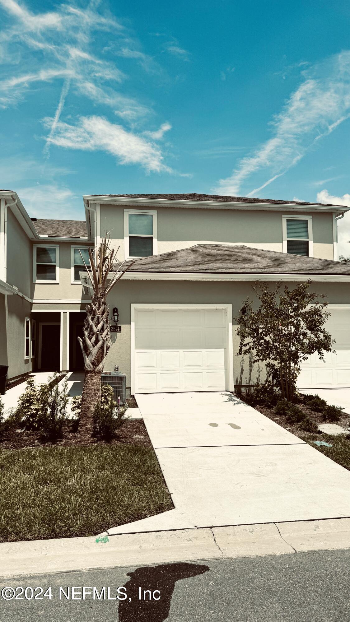 a view of house with outdoor space