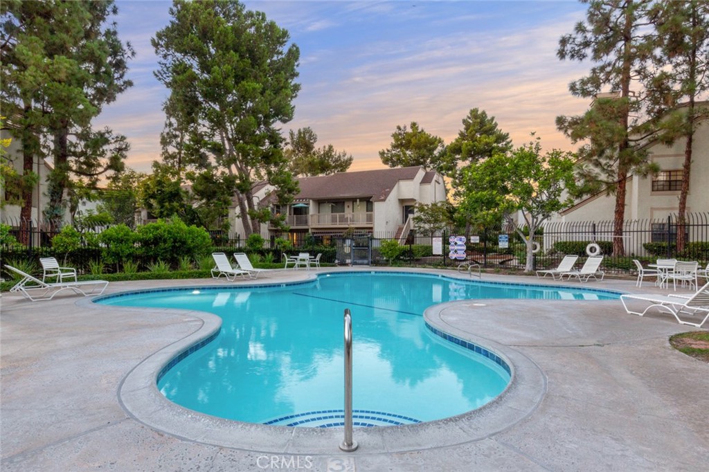 a view of a house with swimming pool