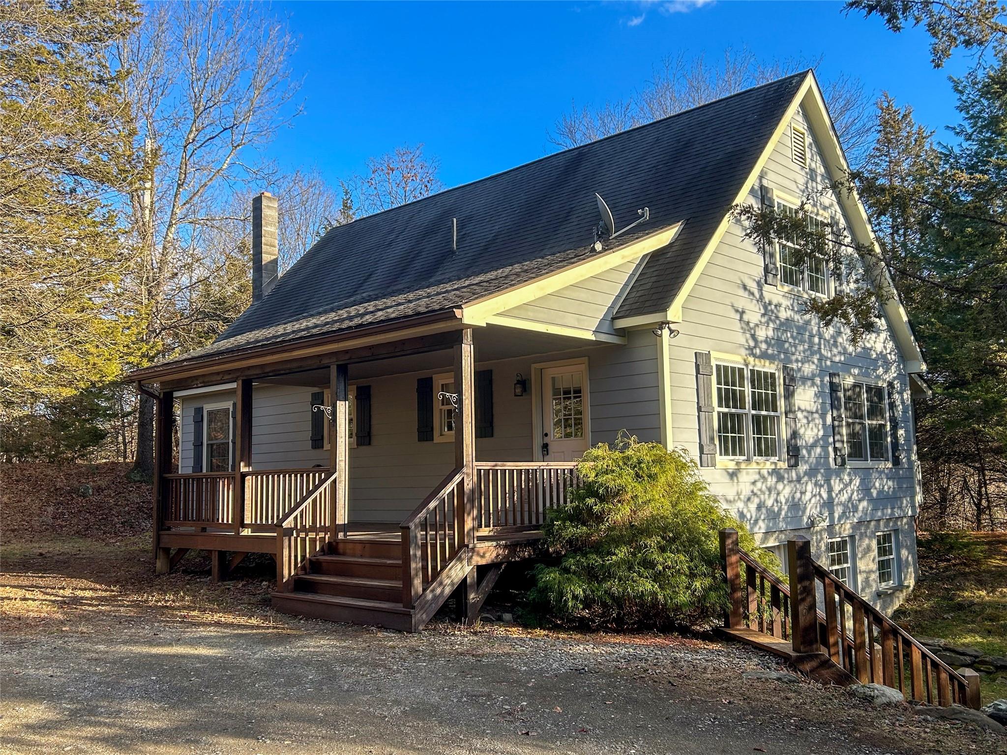 View of front of property featuring covered porch