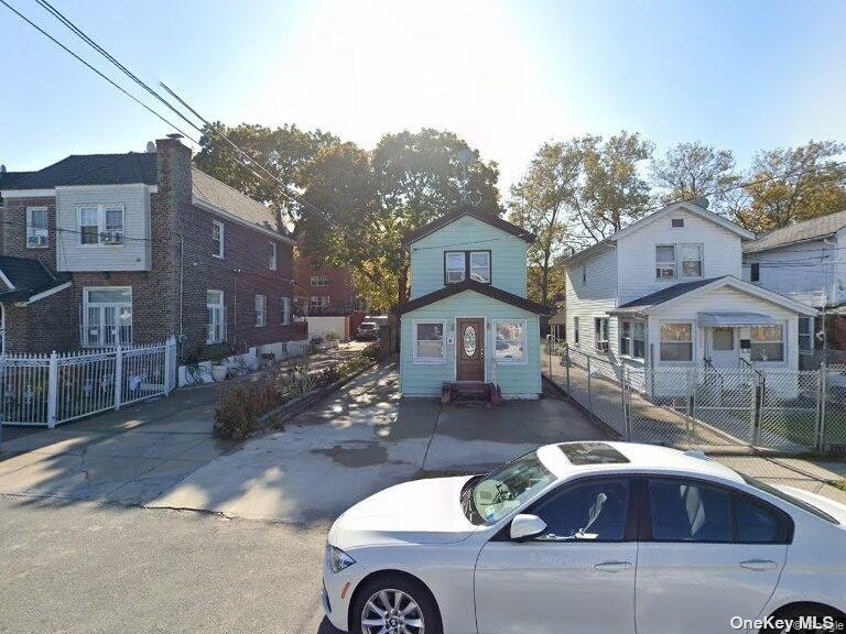 a front view of a house with yard