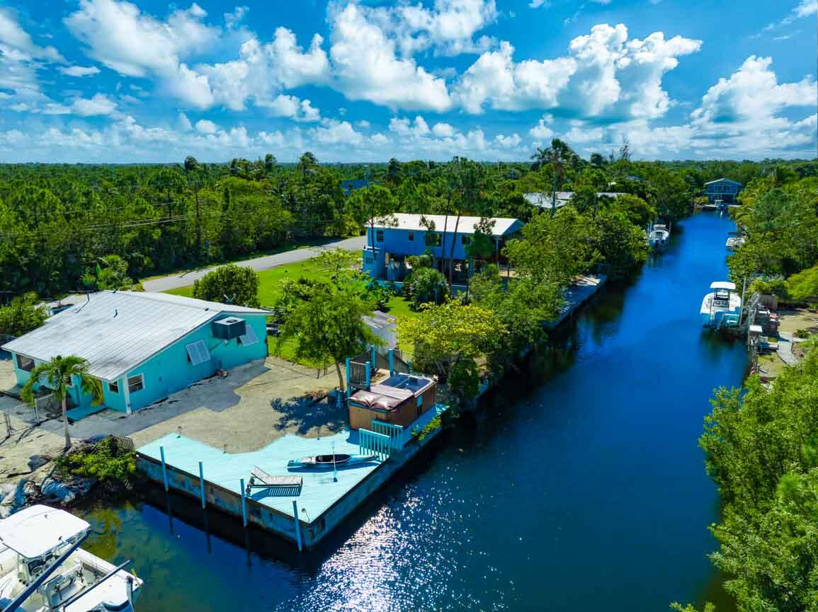 an aerial view of a house having yard