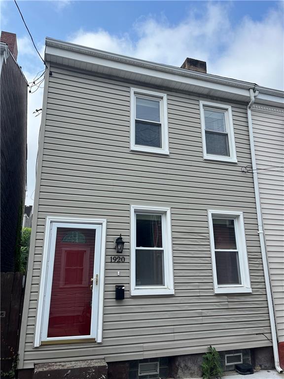 a view of a house with white door