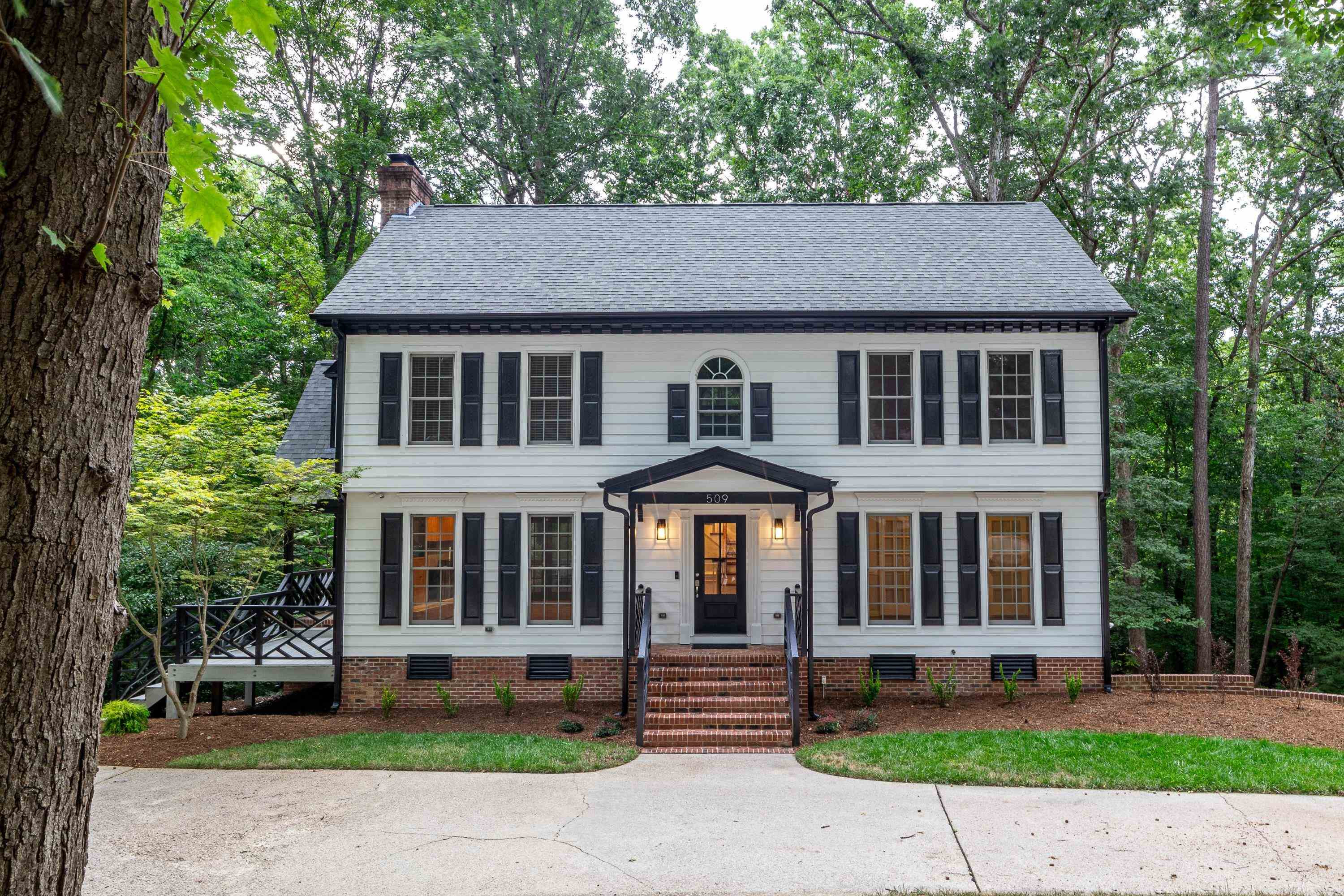 front view of a house with a yard