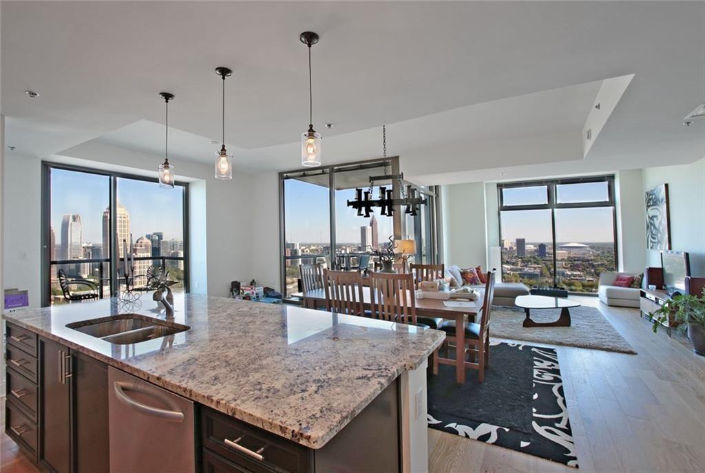 a view of a living room and dining room