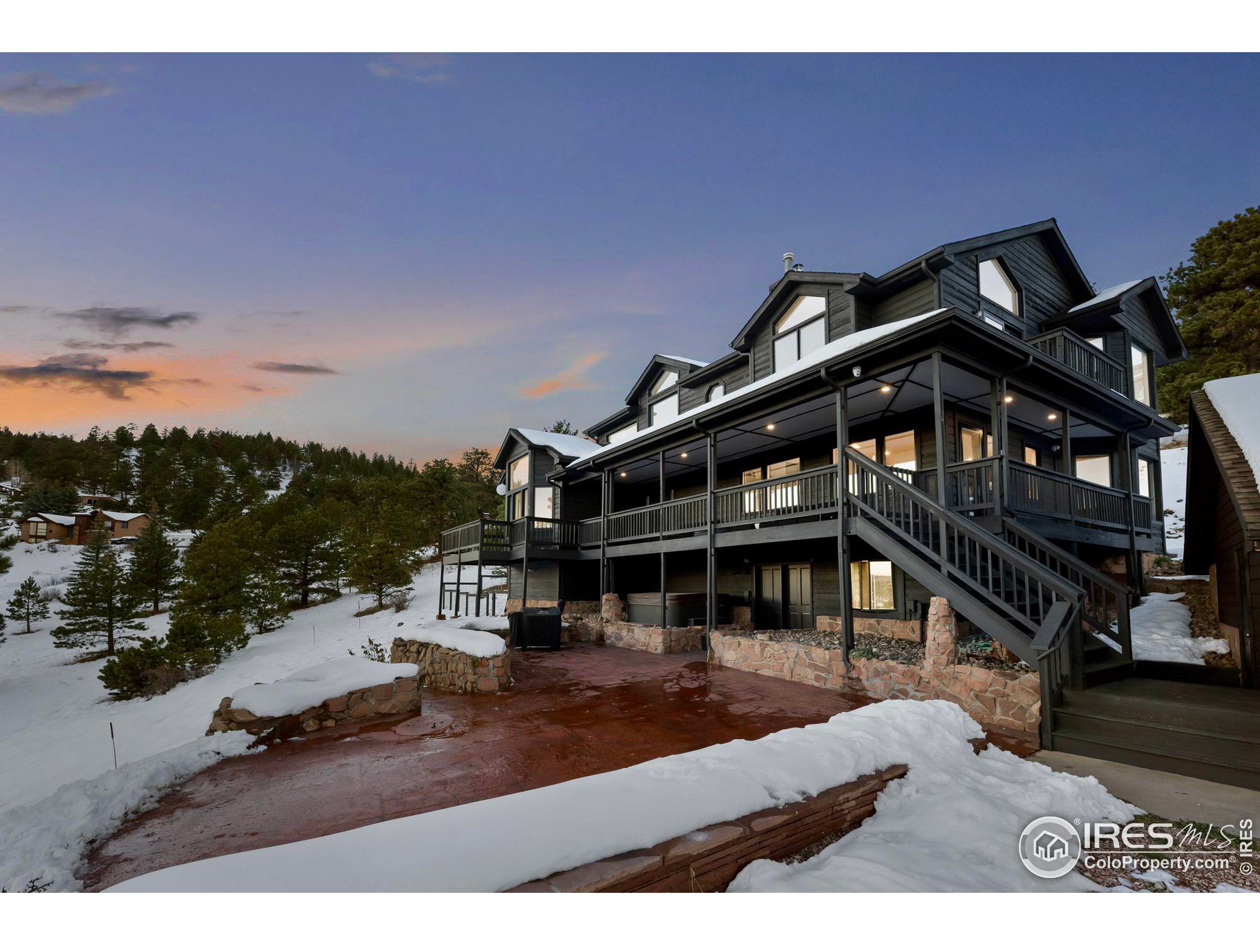 a view of a house with roof deck